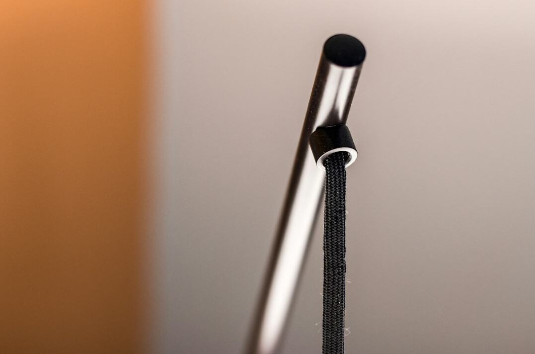 Microphone on a stand with a pop filter